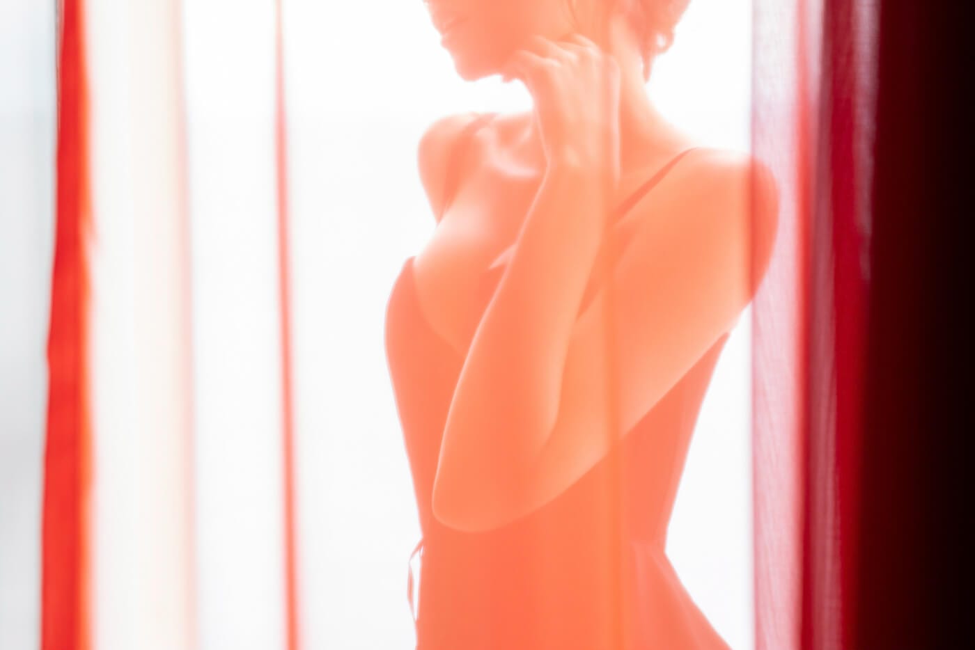 Boudoir photography in NYC captures the essence of femininity and elegance in a discreet and private setting.
