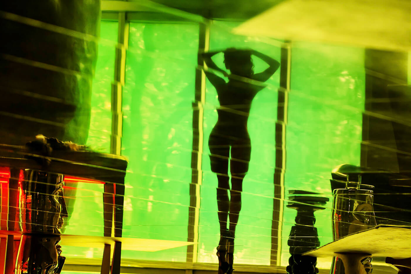 Contemporary boudoir session in Miami, showcasing a woman's silhouette and and fabulous curves.